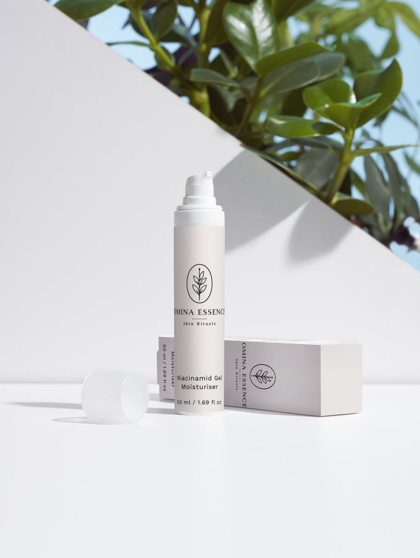 Omina Essence Niacinamide Gel Moisturiser in a white pump bottle with a white cap. Enriched with Vitamin B3 for hydration and even skin tone.