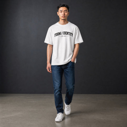 OMINA Studio white heavyweight cotton t-shirt with "FORM / IDENTITY EST. 2026" graphic on front.