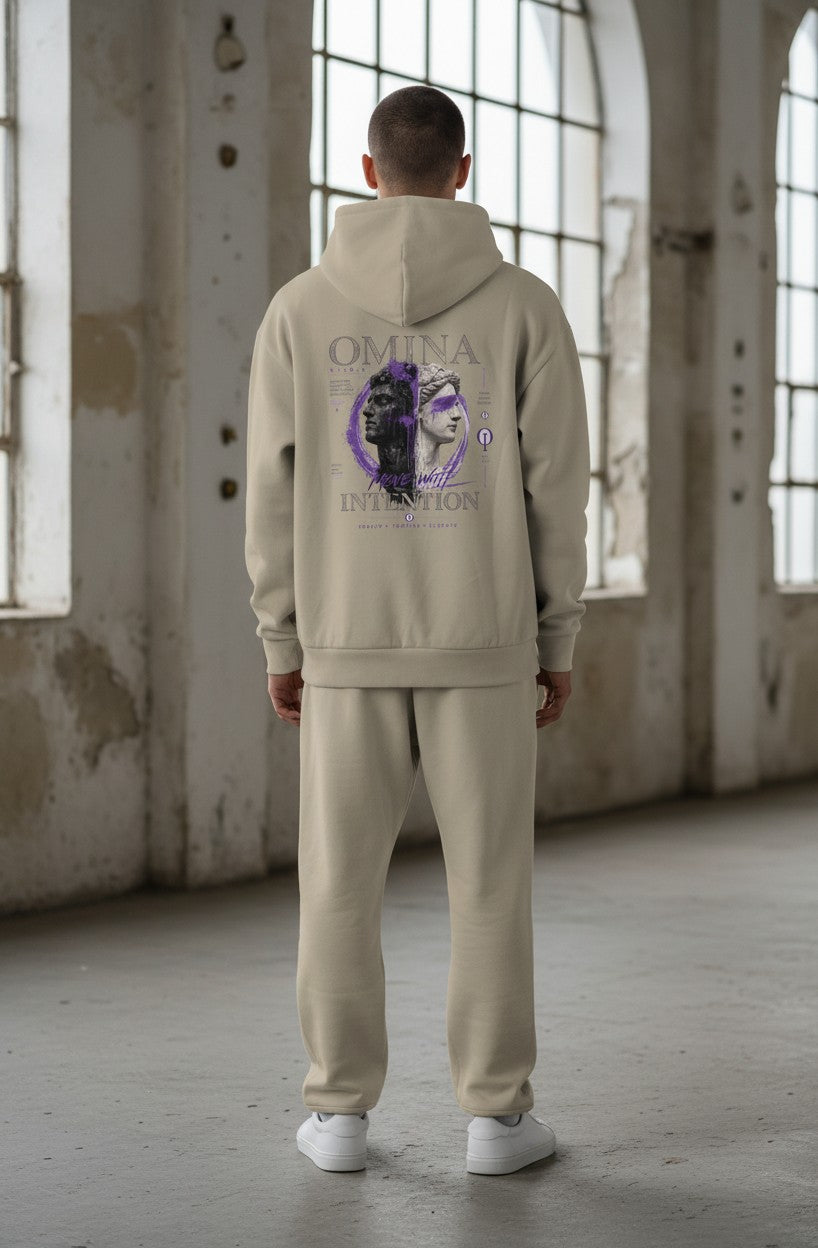 Omina Studio beige heavyweight fleece pullover hooded sweatshirt with graphic print of two busts and purple accents.