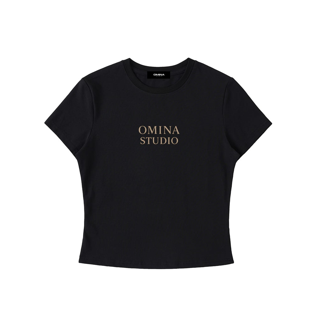 Omina black cotton-spandex blend crewneck t-shirt with "OMINA STUDIO" printed on chest. Bodycon fit.