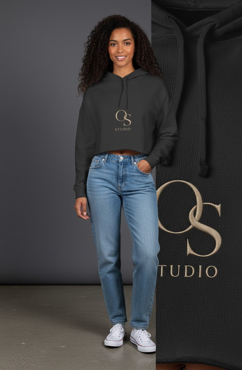Omina black lightweight cotton-poly blend cropped hoodie with drawstring hood and raw hem. Features subtle Omina Studio logo.