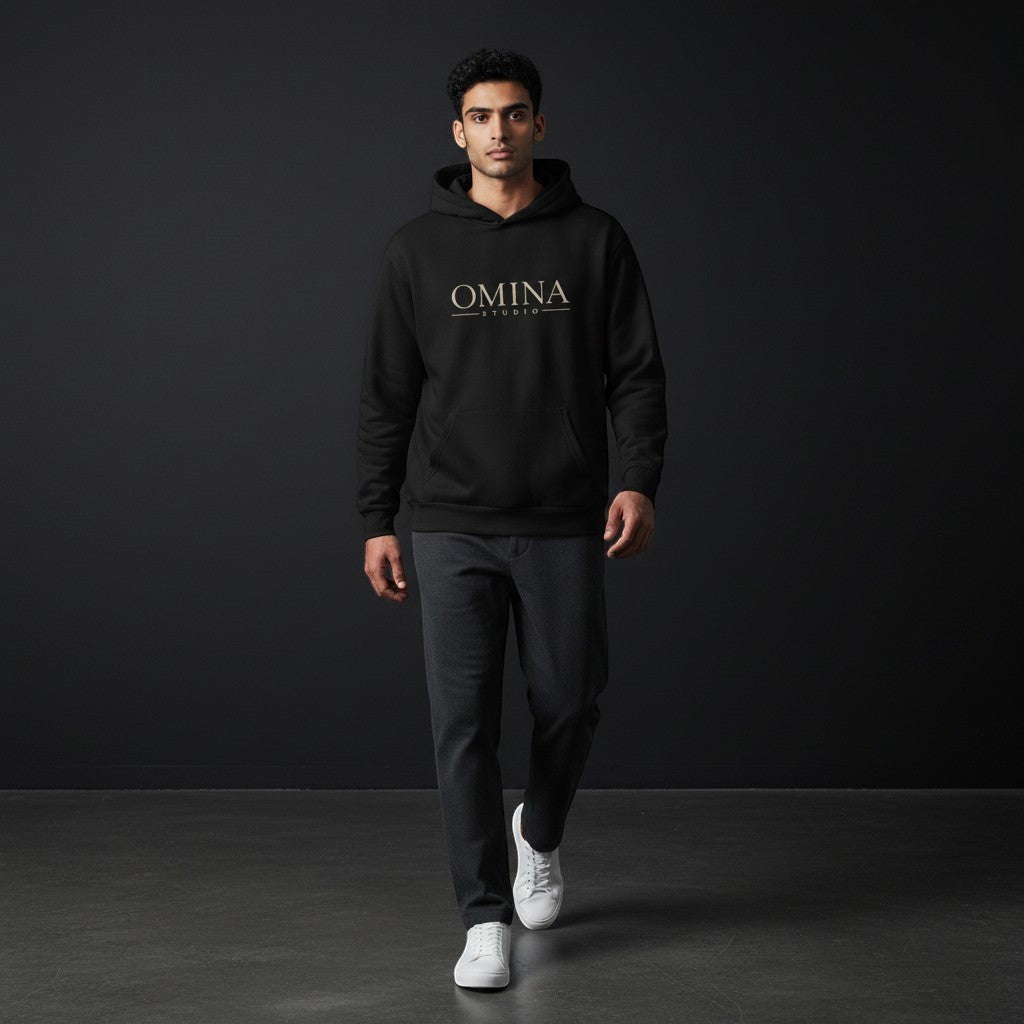 Omina Studio black heavyweight cotton blend oversized hoodie with gold chest logo and graphic back.