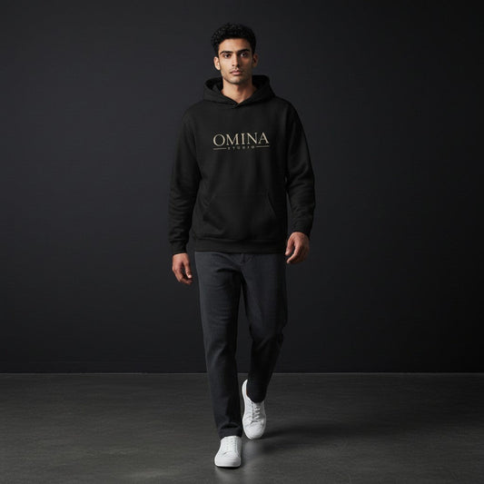 Omina Studio black heavyweight cotton blend oversized hoodie with gold chest logo and graphic back.