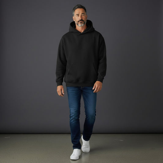 Omina black heavyweight cotton blend hoodie with oversized fit, drop shoulders, and kangaroo pocket.
