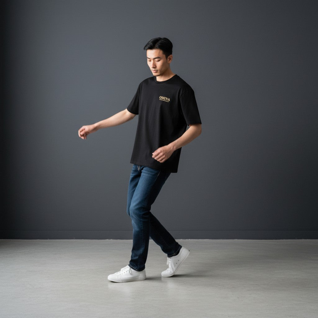 OMINA ESSENTIALS black heavyweight cotton t-shirt with relaxed oversized fit and drop shoulders.