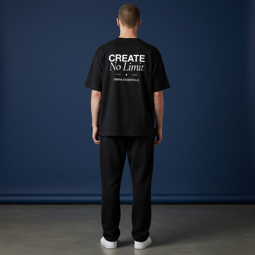Omina Essentials black heavyweight cotton t-shirt with "CREATE NO LIMIT" graphic on back. Relaxed fit.