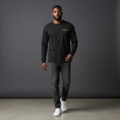 Omina Essentials black long-sleeve t-shirt made from a cotton blend with a relaxed fit and crewneck. Features a small gold logo on the chest.