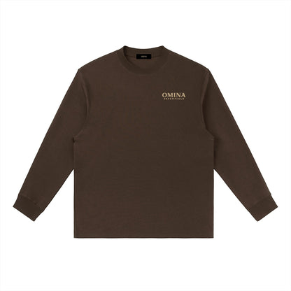 Omina Essentials brown cotton blend long-sleeve t-shirt with crewneck and relaxed fit. Features subtle logo detail on chest.