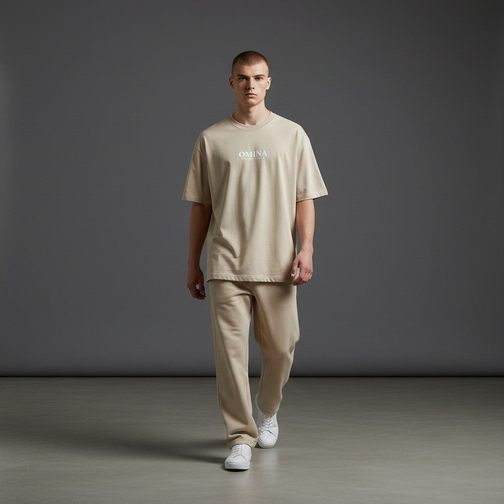 OMINA Essentials heavyweight beige cotton t-shirt with relaxed fit and crew neck, worn by a male model.