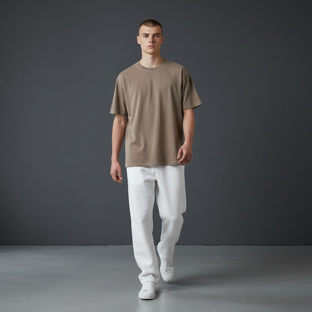 Omina Essentials vintage wash cotton t-shirt in taupe. Relaxed oversized fit with ribbed crew neck.