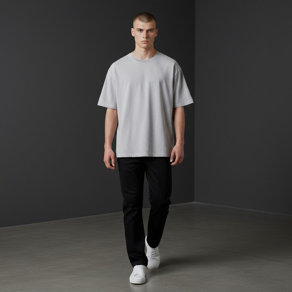 Omina Essentials light grey vintage wash heavyweight cotton t-shirt with ribbed crew neck and oversized fit.