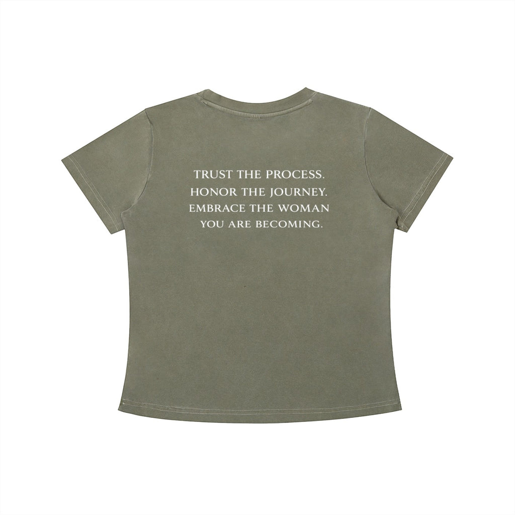 OMINA Essentials olive green cotton t-shirt with vintage wash and white text reading "TRUST THE PROCESS. HONOR THE JOURNEY. EMBRACE THE WOMAN YOU ARE BECOMING."
