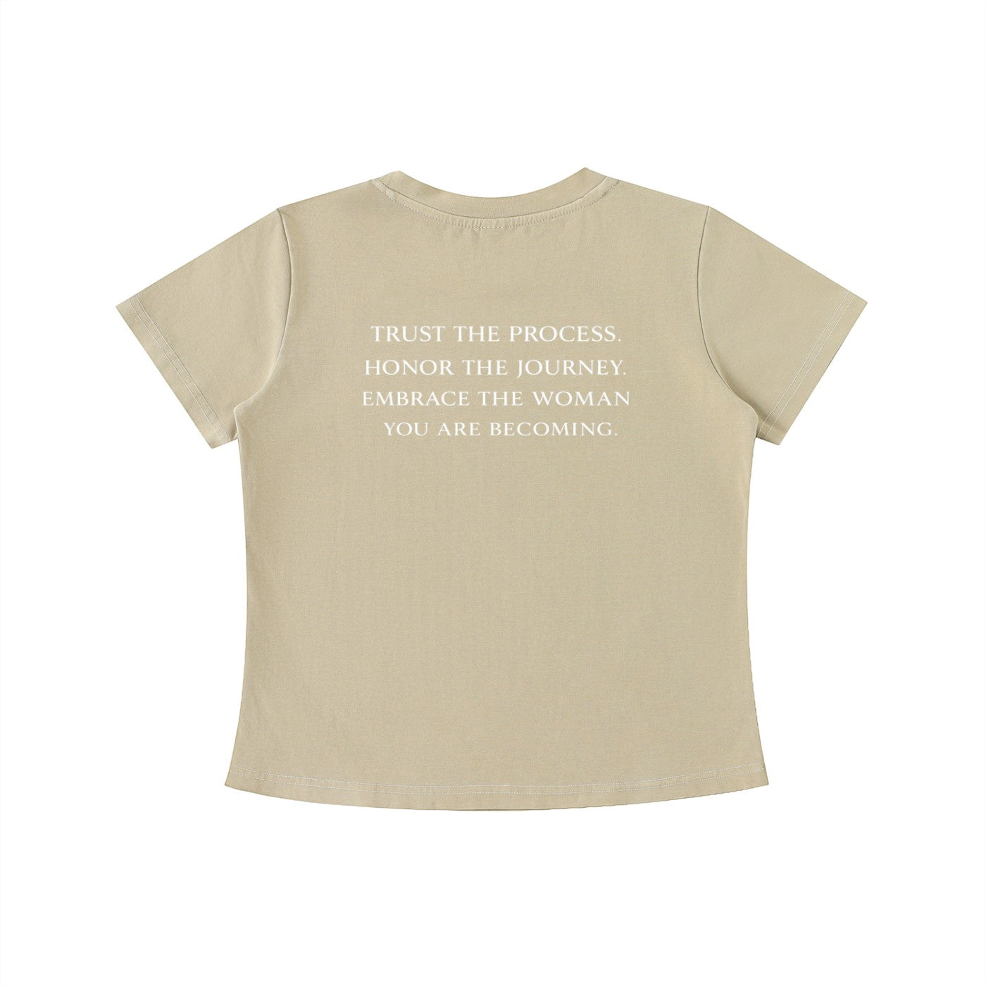 OMINA Essentials beige cotton t-shirt with vintage wash and white text on back: "TRUST THE PROCESS. HONOR THE JOURNEY. EMBRACE THE WOMAN YOU ARE BECOMING."