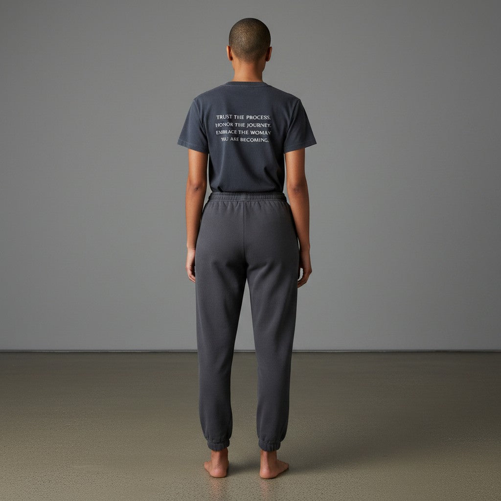 OMINA Essentials dark grey cotton t-shirt with vintage wash and motivational text "Trust the Process. Honor the Journey. Embrace the Woman You Are Becoming."