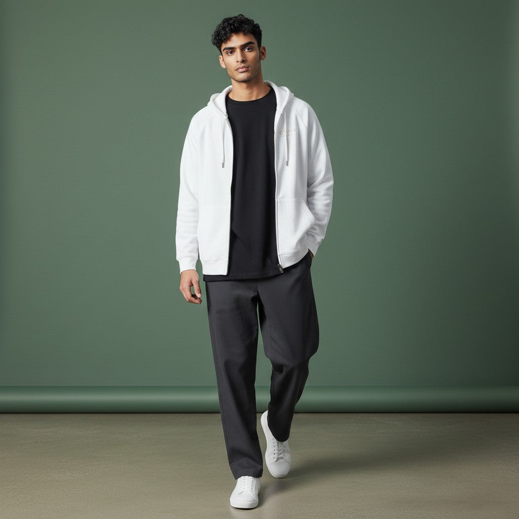 Omina Essentials white full-zip hoodie with raglan sleeves and kangaroo pocket, made from heavyweight combed cotton.