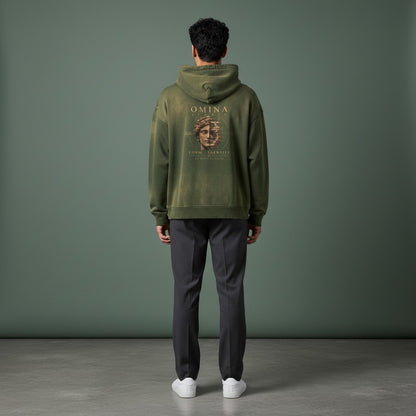 Omina Studio faded olive green cotton hoodie with 'Form / Identity' graphic and distressed details.