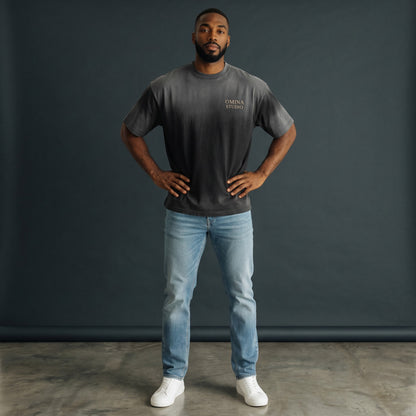 OMINA Studio heavyweight cotton t-shirt with a faded black to grey gradient and minimalist logo.