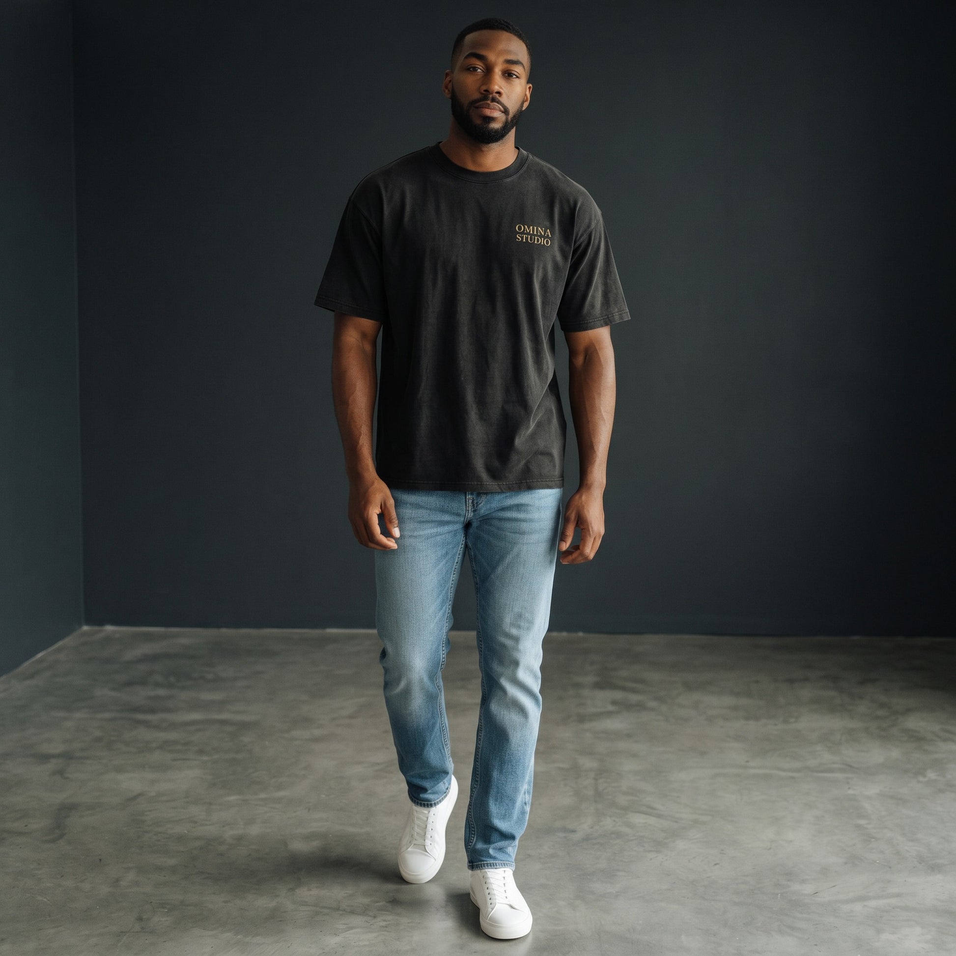 OMINA STUDIO heavyweight cotton t-shirt with a faded black to grey gradient and minimalist logo.