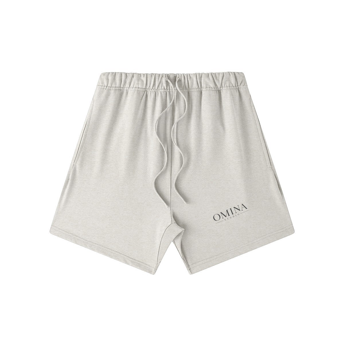 Omina Studio light grey heavyweight French terry shorts with drawstring and subtle logo detail.