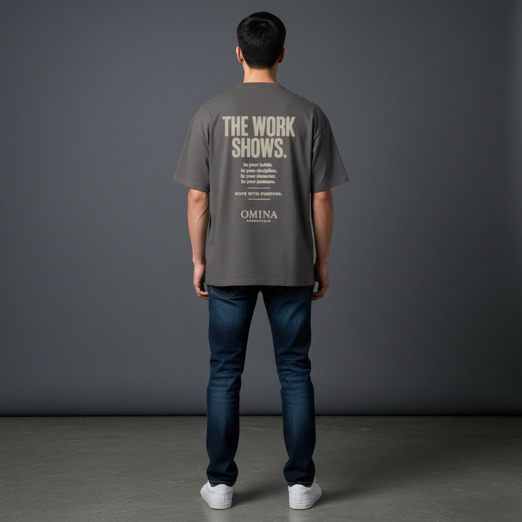 Omina grey cotton t-shirt with "The Work Shows" graphic print on back. Relaxed fit.