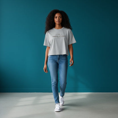 Omina Studio light grey cotton blend cropped t-shirt with Omina Studio logo and Roman numerals MMXXVI on the front.