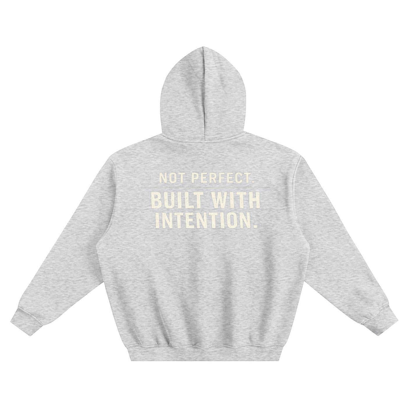Omina grey fleeced boxy hoodie with "NOT PERFECT. BUILT WITH INTENTION." text on back. Relaxed fit, drop shoulders, ribbed cuffs and hem.