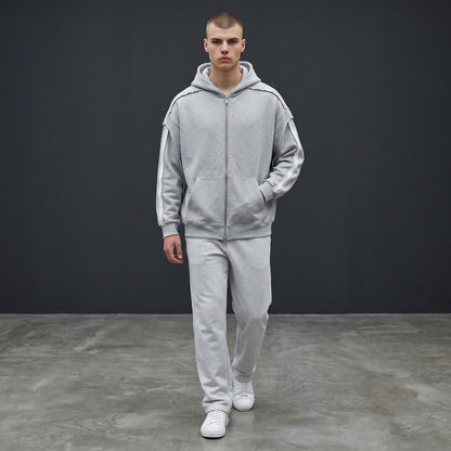 Omina grey cotton-blend zip-up hoodie with raw edge detailing and contrast tape on sleeves. Oversized fit.