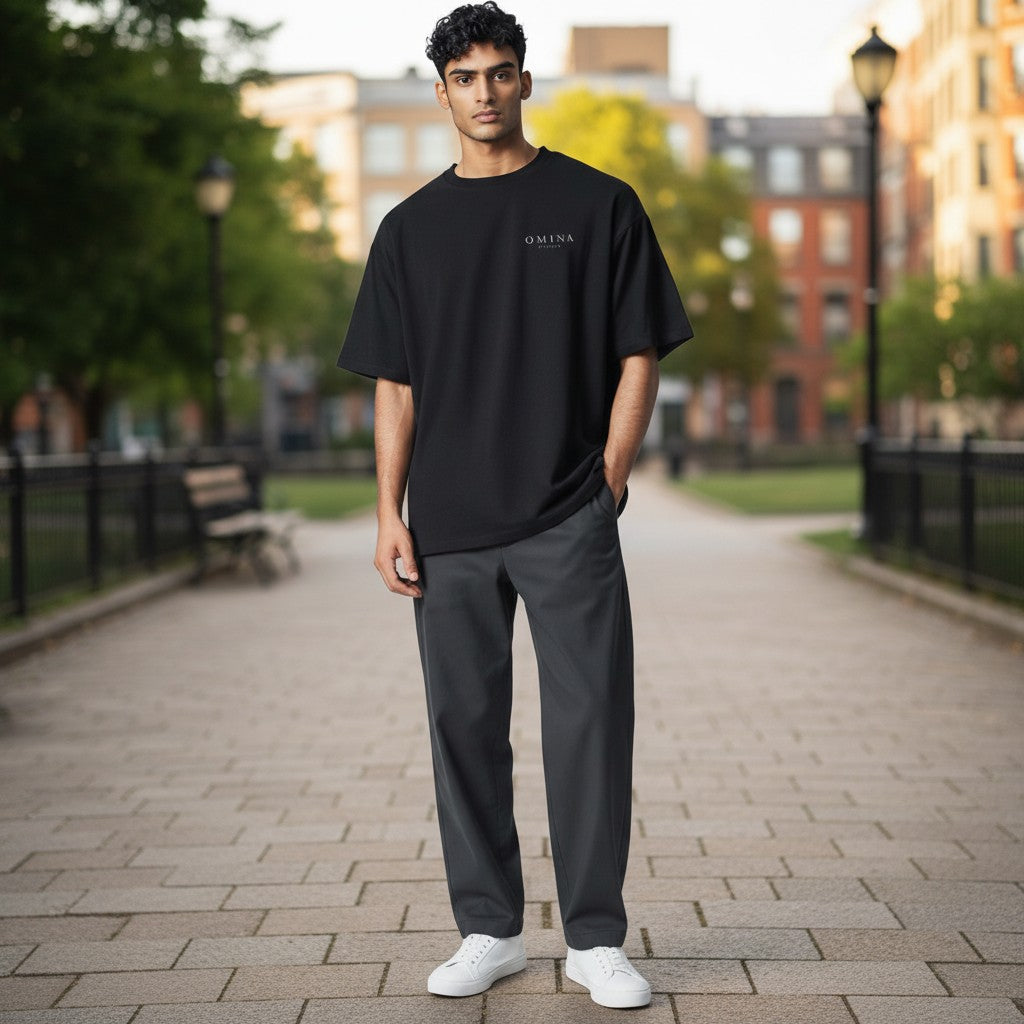 OMINA Studio men's dark grey heavyweight cotton t-shirt with subtle logo detail on chest.