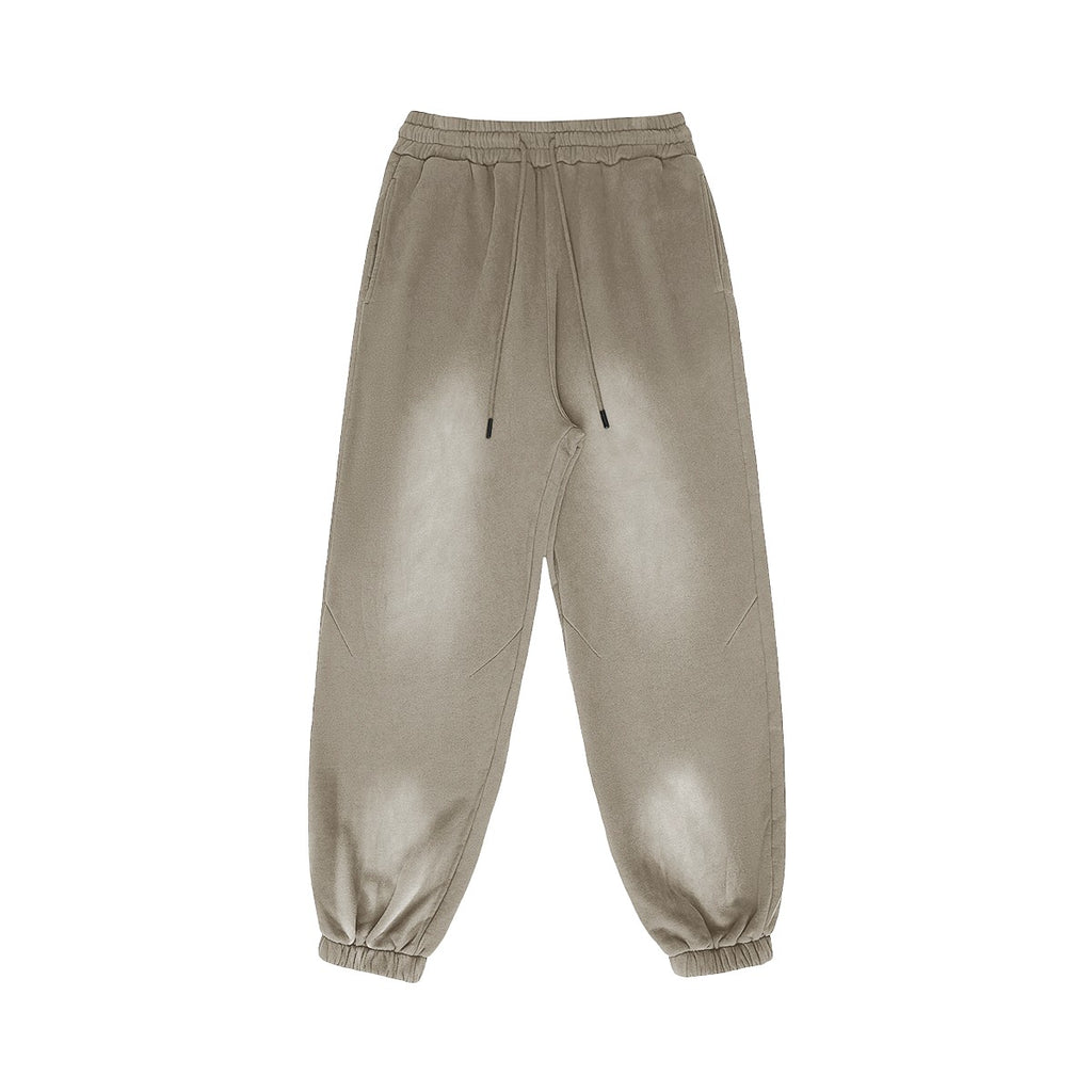 Omina Studio vintage-inspired heavyweight sweatpants in a washed taupe color. Relaxed fit with elastic waistband and drawstrings.
