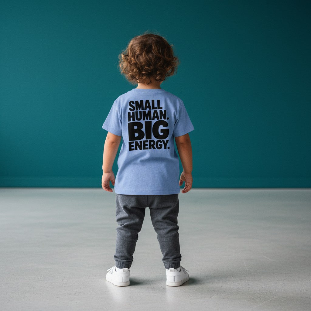 Omina Kids toddler tee in light blue with black text that reads "SMALL HUMAN. BIG ENERGY."