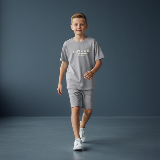 Omina Kids grey cotton t-shirt with "Future In Motion" and "Omina Kids" text in gold on the back.
