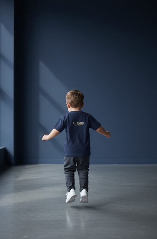 OMINA Kids navy blue cotton t-shirt with "FUTURE IN MOTION OMINA KIDS" text graphic on back. Relaxed fit, breathable.