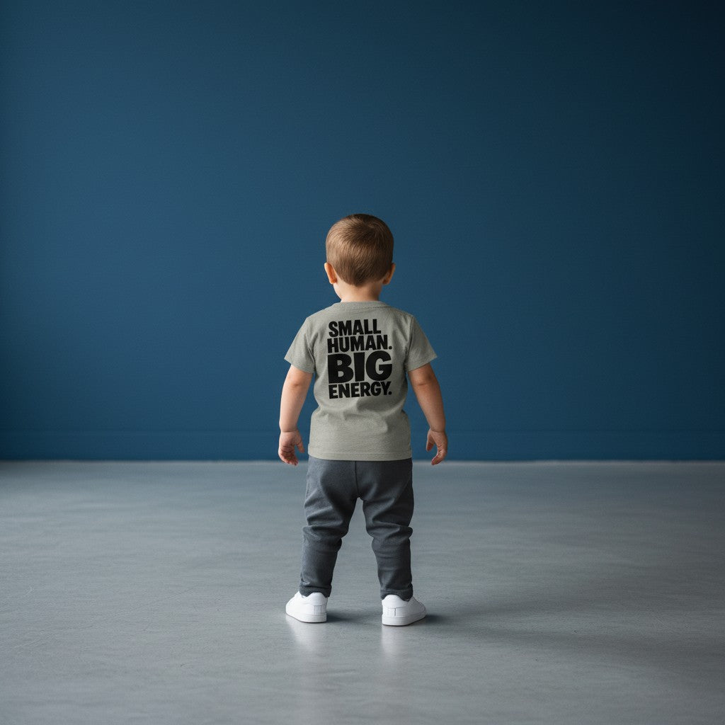 Omina Kids toddler tee in grey triblend fabric with black text "SMALL HUMAN. BIG ENERGY."