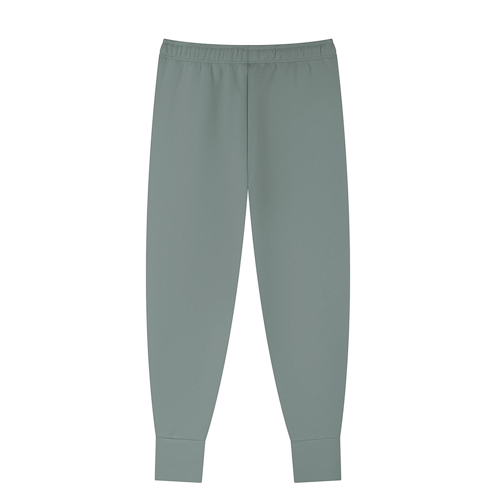 Omina men's tapered leg joggers in a muted green. Made from a polyester-spandex blend with a drawstring waist and cuffed ankles.