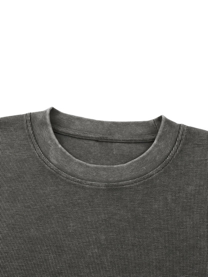 Omina charcoal grey mineral wash waffle knit t-shirt with ribbed crew neck and drop shoulders.