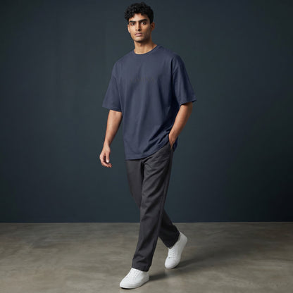 Omina navy blue 100% cotton oversized fit crew neck t-shirt with subtle Omina logo embossed on chest.