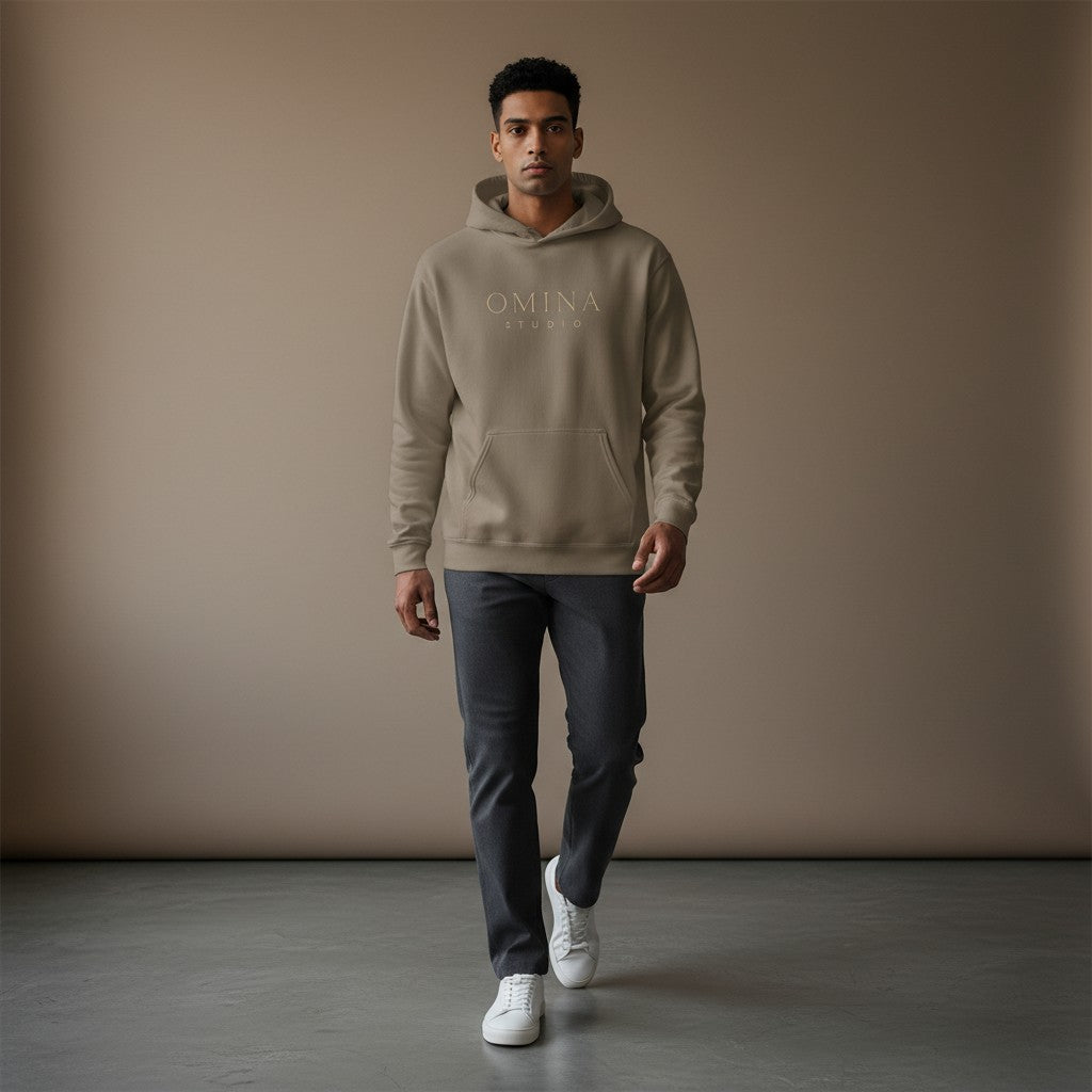 Omina Studio sandstone on black OS Medusa hoodie with embroidered logo and graphic. Midweight cotton blend with relaxed fit.