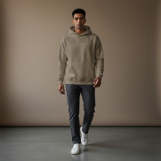 Omina Studio sandstone on black OS Medusa hoodie with embroidered logo and graphic. Midweight cotton blend with relaxed fit.