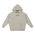 Omina Studio beige heavyweight cotton hoodie with relaxed oversized fit and front pocket. Minimalist design.