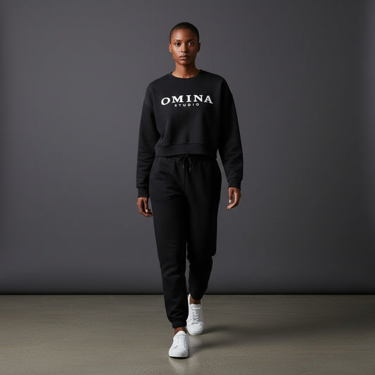 OMINA STUDIO black vintage washed cropped sweatshirt with oversized fit and drop shoulders.
