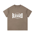 Omina Studio taupe vintage wash 100% cotton t-shirt with white 'Blessed' graphic print and short sleeves.