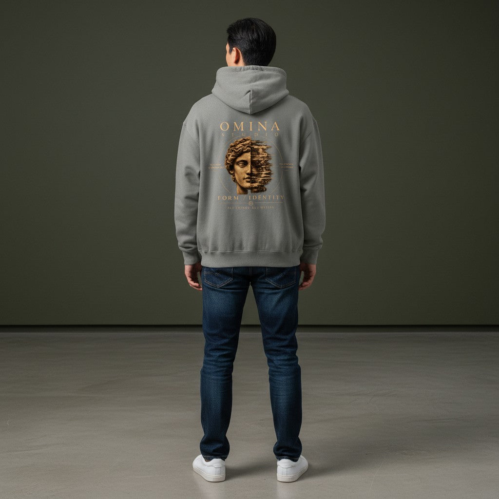 Omina Studio grey heavyweight fleece hoodie with a drop-shoulder silhouette and graphic print of a classical bust.