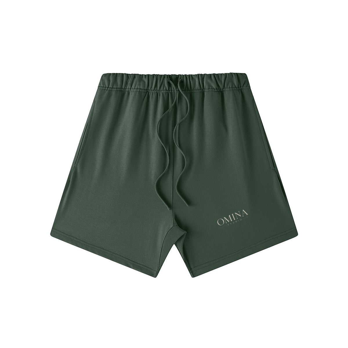 Omina Studio dark green heavyweight French terry shorts with elastic waist, drawstring, and side pockets. Oversized fit.