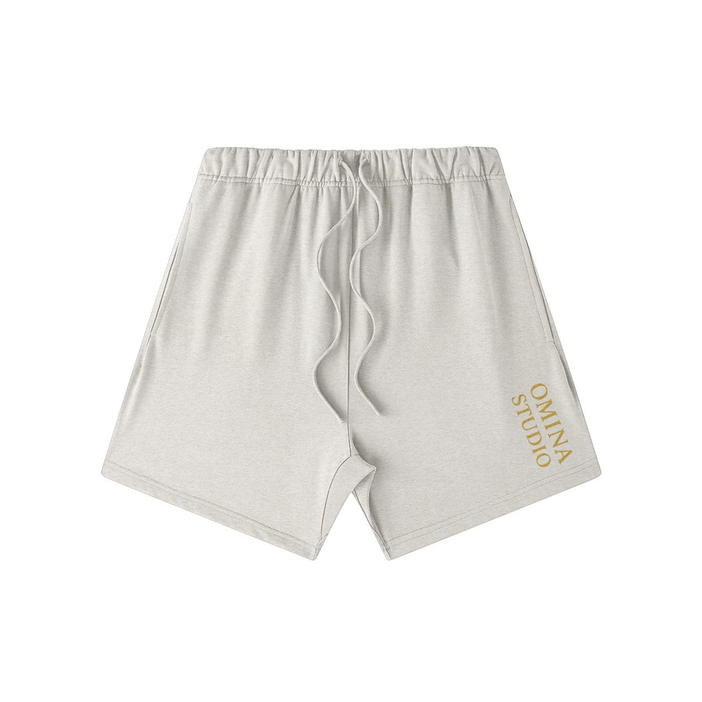 Omina Studio light grey heavyweight French terry cotton shorts with drawstring and gold logo