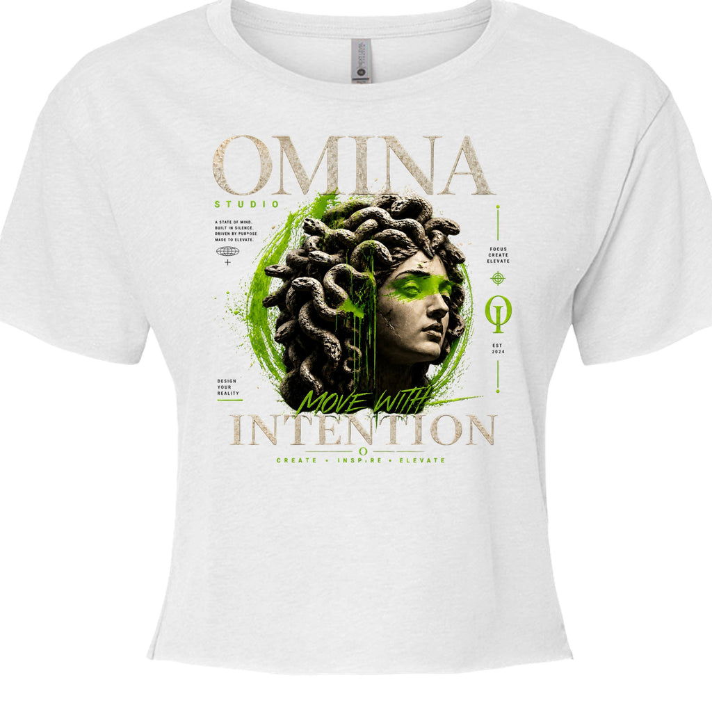 Omina Studio white cropped t-shirt with a Medusa bust graphic and green accents. Relaxed fit, raw hem.