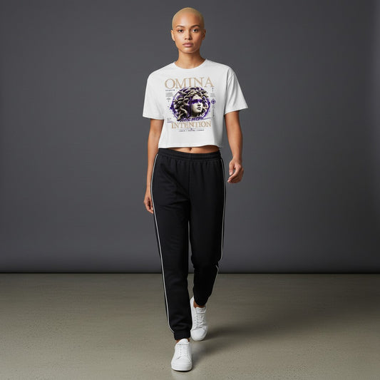 Omina Studio white cropped heavyweight tee with Medusa graphic and "Move With Intention" text.