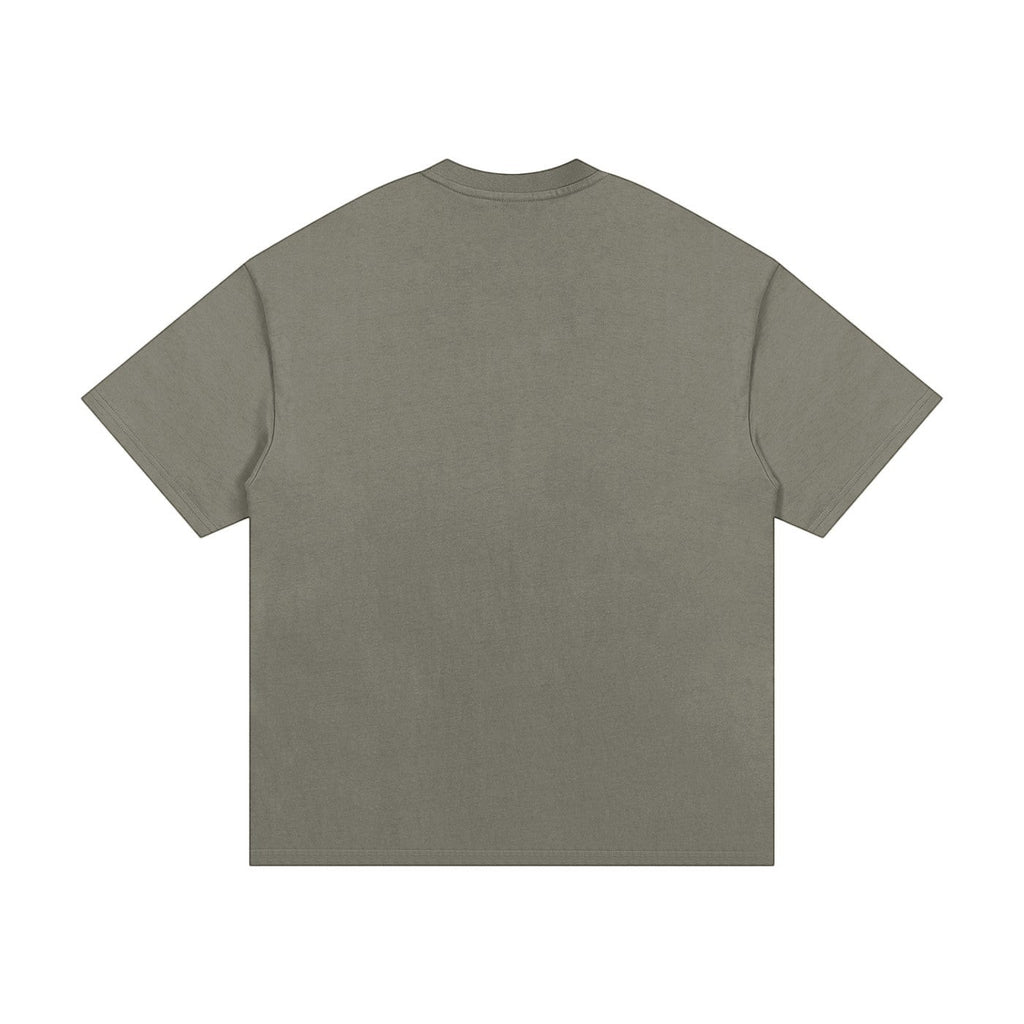OMINA Studio heavyweight cotton t-shirt in olive green with an oversized relaxed fit and drop shoulders.