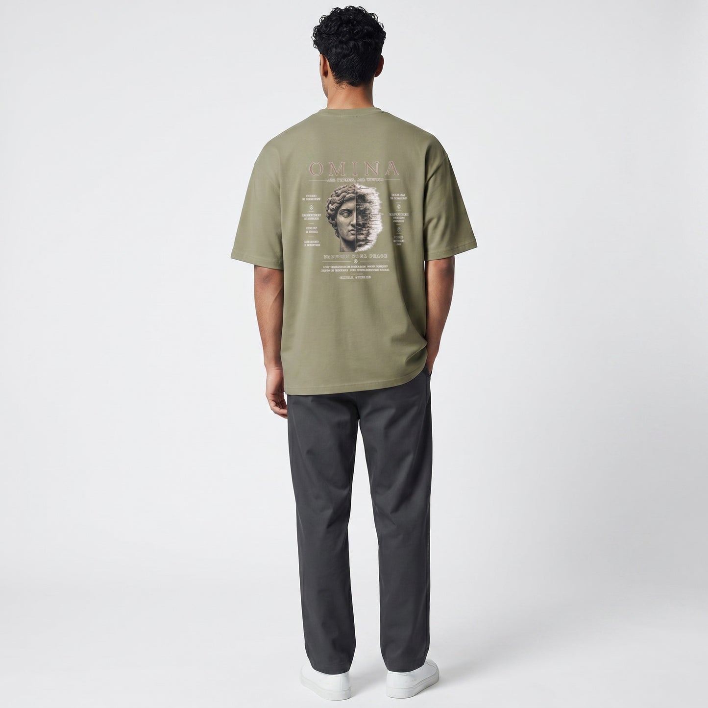 Omina Studio oversized fit crew neck t-shirt in light olive green, made from 100% cotton with graphic print on back.