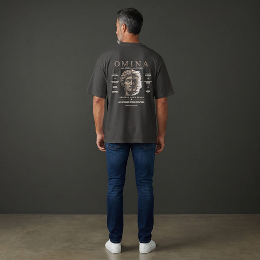 OMINA Studio dark grey heavyweight cotton t-shirt with 'Protect Your Peace' graphic on back.