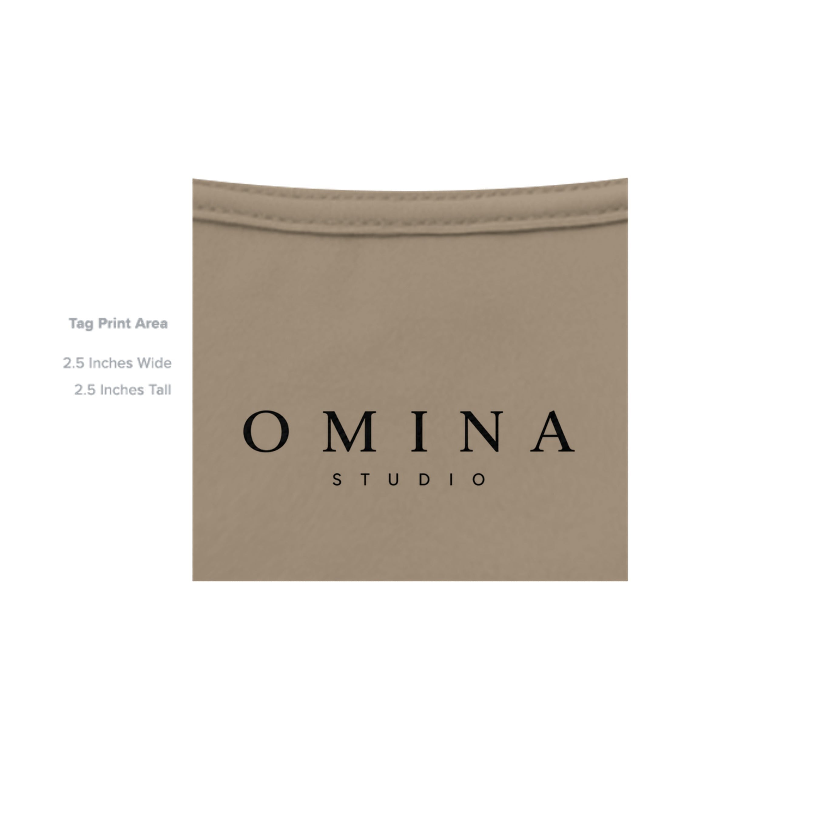 OMINA Studio heavyweight cotton tee in a neutral taupe color with a vintage-inspired graphic.